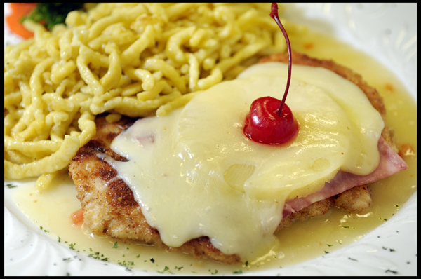 Breaded Chicken Breast topped with Honey Baked Ham, Pineapple and a Swiss Cheese Melt served with Spätzle 